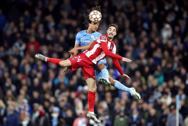 Atletico Madrid's Sime Vrsaljko in action with Manchester City's Nathan Ake during Champions League Quarter-Final First Leg match at Etihad Stadium, Manchester, Britain, April 5, 2022. (Photo by Phil Noble/Reuters)