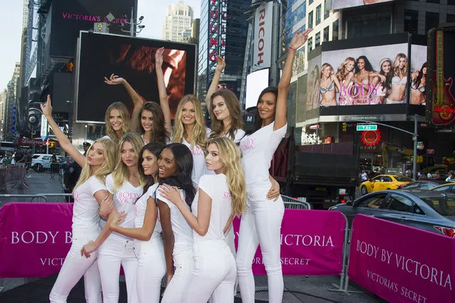 The newest Victoria's Secret Angels, clockwise from top left, Kate Grigorieva, Taylor Hill, Romee Strijd, Jac Jagaciak, Lais Ribeiro, Stella Maxwell, Jasmine Tookes, Sara Sampaio, Martha Hunt and Elsa Hosk launch the Body By Victoria campaign in Times Square on Tuesday, July 28, 2015, in New York. (Photo by Charles Sykes/Invision/AP Photo)