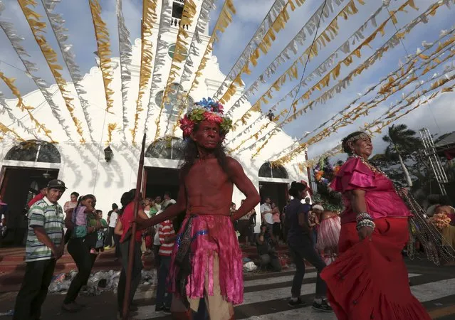 People dressed as Red Indian dance during celebrations honouring the patron saint of Managua, Santo Domingo de Guzman, in Managua, Nicaragua July 31, 2015. (Photo by Oswaldo Rivas/Reuters)