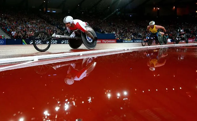 England's David Weir on his way to gold in the Men's T54 1500m at Hampden Park, during the 2014 Commonwealth Games in Glasgow, on July 31, 2014. (Photo by David Davies/PA Wire)