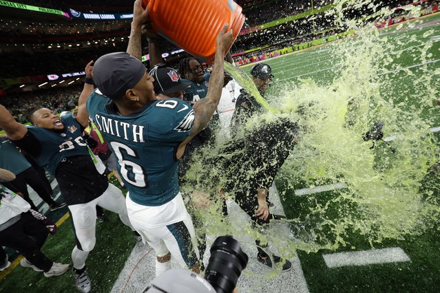 Philadelphia Eagles wide receiver DeVonta Smith (6) dunks head coach Nick Sirianni during the second half of the NFL Super Bowl 59 football game against the Kansas City Chiefs, Sunday, February 9, 2025, in New Orleans. (Photo by Mike Segar/Reuters)