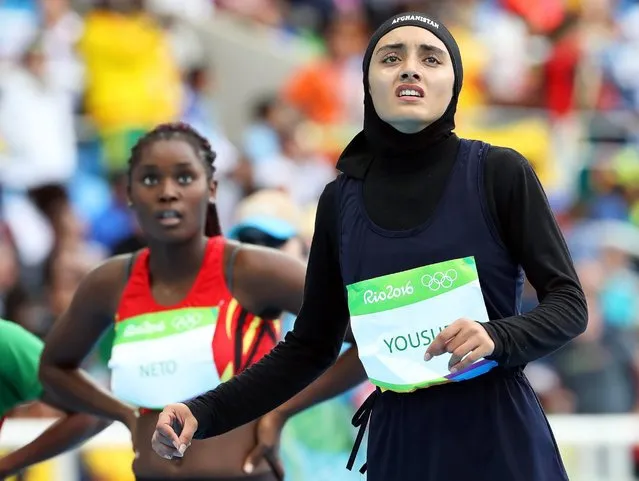 Kamia Yousufi of Afghanistan reacts after competing in the track and field women's 100m heats of the 2016 Rio Olympics, August 12, 2016. (Photo by Srdjan Suki/EPA)