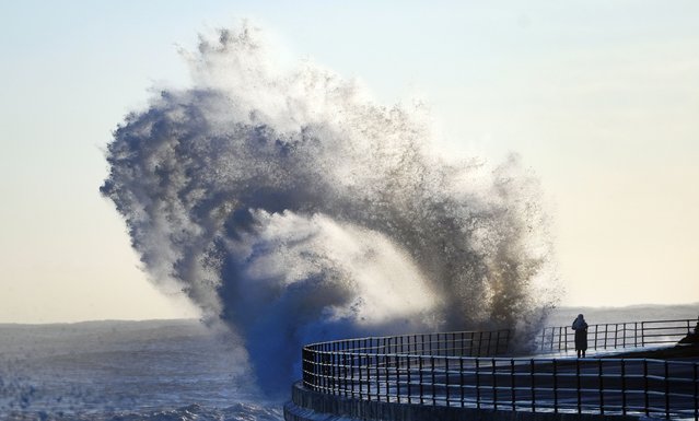 Huge waves smash against the sea front at Whitley Bay in North Tyneside on Wednesday, January 8, 2025. Weather warnings for snow and ice are in force across much of the UK after severe flooding and snow caused travel disruption and school closures. (Photo by Owen Humphreys/PA Images via Getty Images)