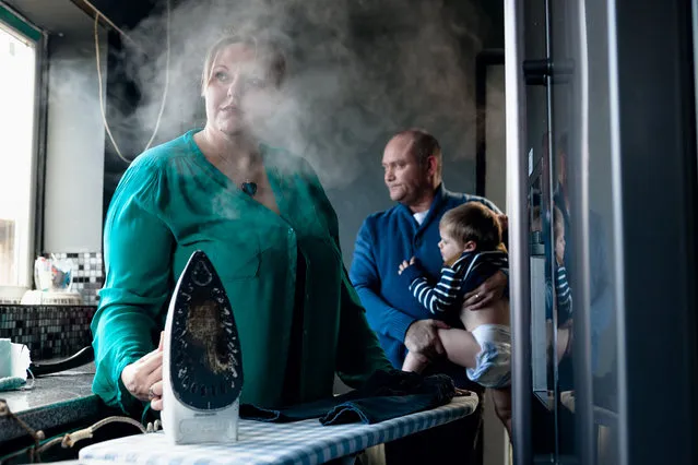 “Juliette and her family”. Juliette suffered from post-natal depression after all three of her pregnancies. She now promotes awareness of the condition. She lives with her young family in Birmingham in the United Kingdom. Photo location: Birmingham. (Photo and caption by Charlie Clift/National Geographic Photo Contest)