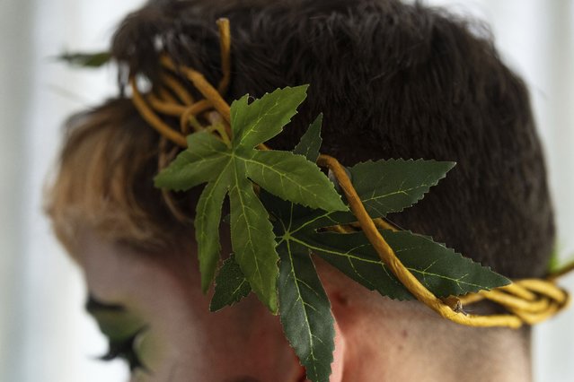 Drag performer Ed De'Bull wears a crown with faux marijuana leaves during a “blaze and praise” drag brunch at Bar Carlo on Sunday, April 20, 2025, in Portland, Ore. (Photo by Jenny Kane/AP Photo)