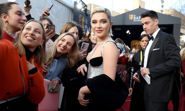 Florence Pugh Florence Pugh with fans as she attendsthe EE BAFTA Film Awards 2024 at The Royal Festival Hall on February 18, 2024 in London, England. (Photo by Lia Toby/BAFTA/Getty Images for BAFTA)