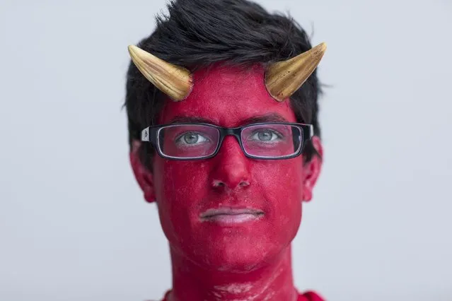 Dennis Mooney attends New York Comic Con dressed as The Devil in Manhattan, New York, October 8, 2015. (Photo by Andrew Kelly/Reuters)