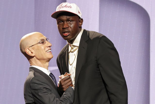 Khaman Maluach reacts as he greets NBA commissioner Adam Silver after being selected 10th by the Houston Rockets in the first round of the NBA basketball draft, Wednesday, June 25, 2025, in New York. (Photo by Adam Hunger/AP Photo)