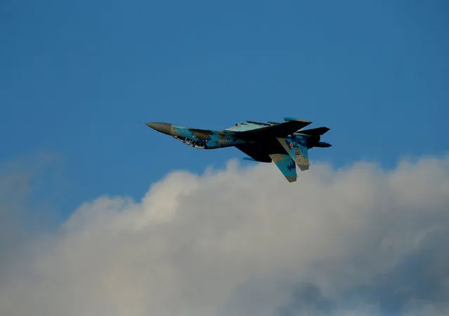 A Ukraine Air Force Su-27 Flanker fighter aircraft performs an inverted flypast during the Malta International Airshow off SmartCity Malta, outside Valletta, Malta, September 24, 2016. (Photo by Darrin Zammit Lupi/Reuters)