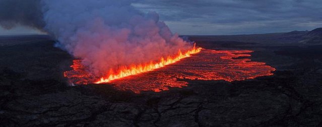 Lava emerges through a fissure following a volcano eruption near Grindavík, Iceland, on Wednesday, July 16, 2025. (Photo by Hordur Kristleifsson/Civil Protection Of Iceland via Reuters)