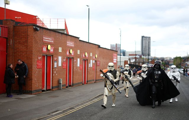 Fans dressed as Star Wars characters Darth Vader and storm troopers are seen outside the stadium before the match between Sheffield United and Nottingham Forest during Star Wars day in Sheffield, Britain on May 4, 2024. (Photo by Carl Recine/Reuters)