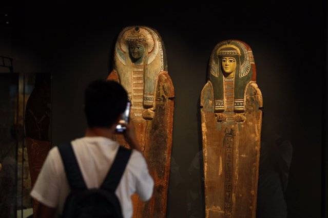 Tourists visit the Grand Egyptian Museum, located near the Pyramids of Giza, in Giza, Egypt, on October 14, 2025. The museum displays thousands of artifacts from prehistoric, Pharaonic, and Roman eras, including the golden treasures of King Tutankhamun, whose tomb was discovered in 1922. The site attracts thousands of visitors each year with its twelve exhibition halls, gardens, and cultural spaces. (Photo by Fareed Kotb/Anadolu via Getty Images)