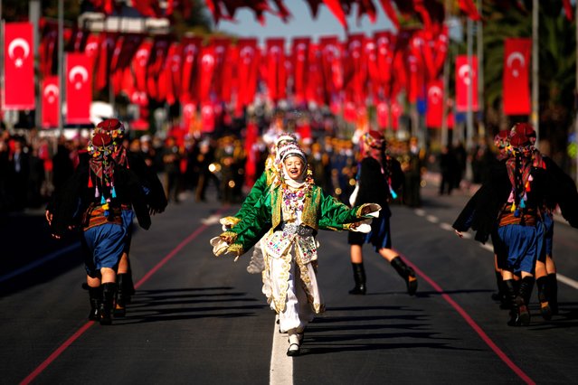 Young women wearing folk traditional costumes parade as part of celebrations marking the 102nd anniversary of the creation of the modern Turkish Republic, in Istanbul, Turkey, Wednesday, October 29, 2025. (Photo by Emrah Gurel,/AP Photo)