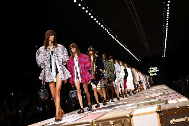 Models wear creations as part of the Louis Vuitton Spring/Summer 2025 collection presented Tuesday, October 1, 2024, in Paris. (Photo by Vianney Le Caer/Invision/AP Photo)