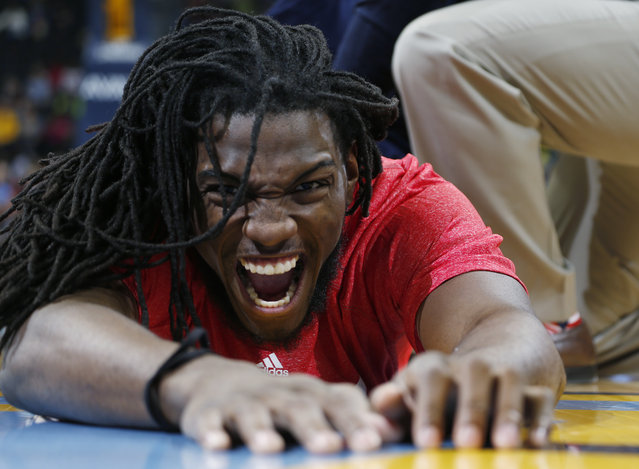 Denver Nuggets forward Kenneth Faried reacts as he is stretched before facing the Washington Wizards in an NBA basketball game Sunday, January 25, 2015, in Denver. (Photo by David Zalubowski/AP Photo)