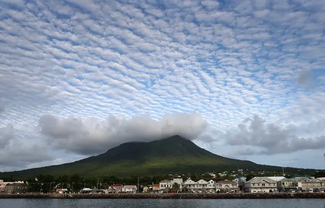 Cloud formations over the volcanic peak on Nevis on the fourth day of an official visit on November 23, 2016 in Port Zante, St Kitts and Nevis. Prince Harry's visit to The Caribbean marks the 35th Anniversary of Independence in Antigua and Barbuda and the 50th Anniversary of Independence in Barbados and Guyana.  (Photo by Chris Jackson/Getty Images)