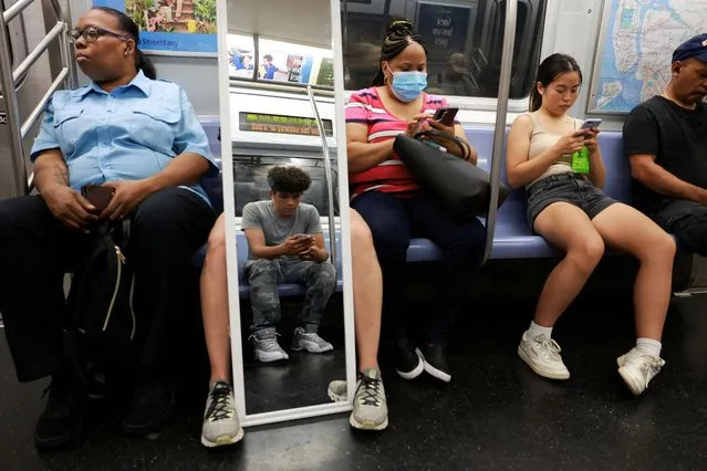 Commuters ride the subway train in New York City, U.S., July 7, 2023. (Photo by Amr Alfiky/Reuters)