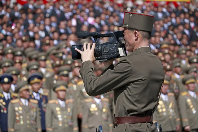 A North Korean soldier films the activities during a parade celebrating the National Day and 70th anniversary of its Foundation in Pyongyang, North Korea, on September 9, 2018. (Photo by How Hwee Young/EPA/EFE)