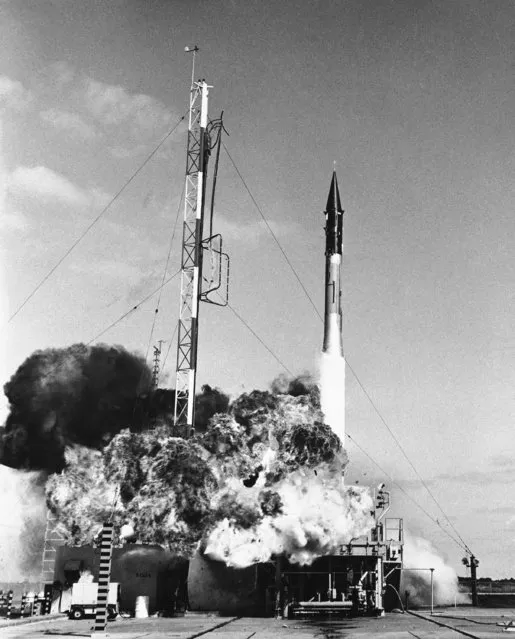 The Vanguard rocket throws out smoke and fire as it explodes at firing at Cape Canaveral, Florida, December 6, 1957. This is the test vehicle which was to have carried America's first earth satellite sphere aloft. (Photo by AP Photo)