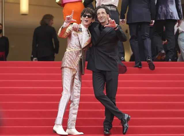 Timothee Chalamet, left, and Adrien Brody pose for photographers upon arrival at the premiere of the film “The French Dispatch” at the 74th international film festival, Cannes, southern France, Monday, July 12, 2021. (Photo by Brynn Anderson/AP Photo)