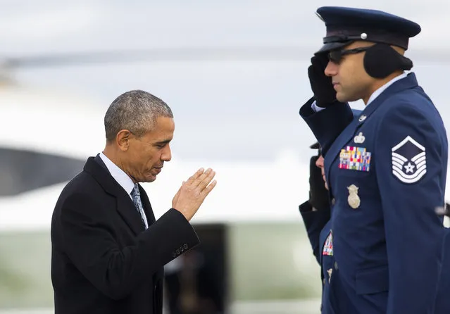 President Barack Obama returns a salute as he boards Air Force One before his departure from Andrews Air Force Base, Md.,Wednesday, February 10, 2016. Obama is returning to Springfield, Ill., the place where his presidential career began, to mark the ninth anniversary of his entrance in the 2008 presidential race. He plans to deliver an address to the Illinois General Assembly at the Illinois State Capitol. (Photo by Pablo Martinez Monsivais/AP Photo)