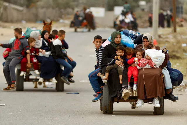 Palestinians flee north Gaza to move southward, as Israeli tanks roll deeper into the enclave, amid the ongoing conflict between Israel and Hamas, in the central Gaza Strip on November 12, 2023. (Photo by Ibraheem Abu Mustafa/Reuters)