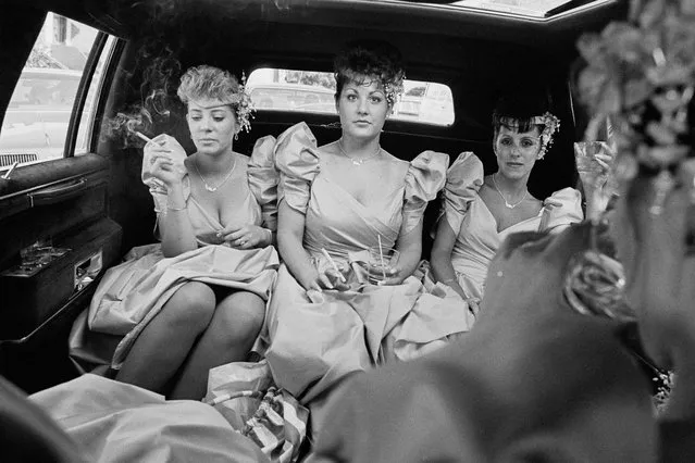 Bridesmaids Smoking, Brooklyn, USA, 1989: “This is my favourite picture”, says Kathy Shorr, “because these girls were familiar to me growing up in Brooklyn. They were tough: you wouldn’t want to get into an argument with them. But they were nice – it was a big happy group of about eight bridesmaids”. (Photo by Kathy Shorr/The Guardian)