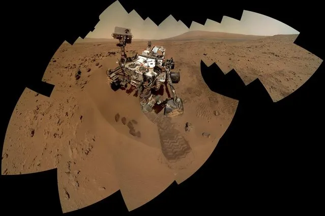 Since 1997, NASA has been sending rovers to Mars to document the soil, dig up rocks, and take pictures of the Martian landscape. But never before has a rover managed to take photos of itself. On August 8, 2012, the aptly named Curiosity touched down and made this ultimate selfie. Stitched together from 63 images, it shows the entire rover and even the imprints in the sand of its scoop and wheels – but not the seven-foot robotic arm that was holding the camera. (Photo by NASA/JPL/Malin Space Science Systems (MSSS)/National Geographic)