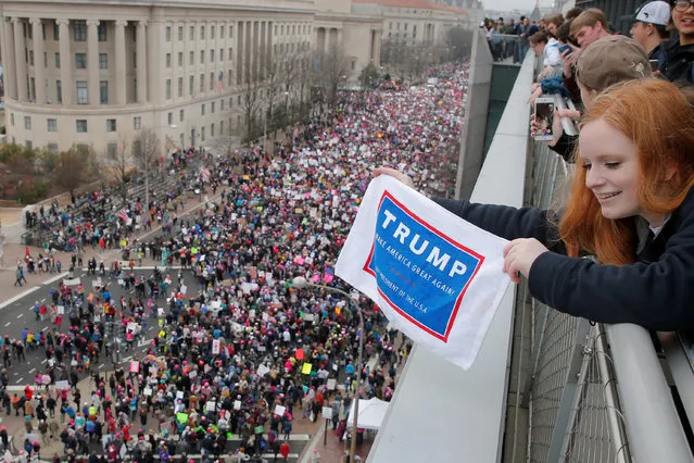 Sixteen year-old Emma Humphries holds a “Trump” towel over the Women's March on Washington, following the inauguration of U.S. President Donald Trump, in Washington, DC, U.S. January 21, 2017. (Photo by Brian Snyder/Reuters)