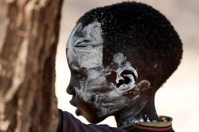 Turkana tribesboy attends a wedding ceremony near Todonyang, Kenya on March 23, 2019. (Photo by Goran Tomasevic/Reuters)