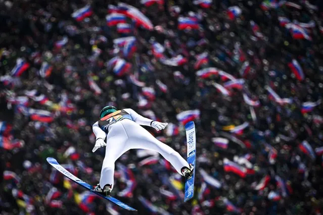 Slovenia's Timi Zajc competes in the Men's Flying Hill team event at the FIS Ski Jumping World Cup in Planica, Slovenia on March 23, 2024. (Photo by Jure Makovec/AFP Photo)