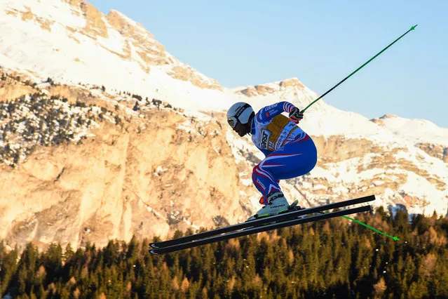 France's Johan Clarey jumps as he trains on December 16, 2021 in Val Gardena, Italian Alps, on the eve of the Men's FIS Ski World Cup Downhill event. (Photo by Tiziana Fabi/AFP Photo)