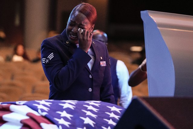 U.S. Air Force personnel react at the coffin of slain airman Roger Fortson during his funeral at New Birth Missionary Baptist Church, Friday, May 17, 2024, near Atlanta. He was shot May 3 by a deputy responding to a possible domestic violence situation at Fortson’s apartment complex. (Photo by Brynn Anderson/AP Photo)