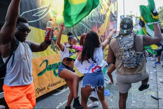 Sound systems make their way down Ladbroke Grove at the Notting Hill Carnival in London, England on August 25, 2019. (Photo by Matthew Chattle/Rex Features/Shutterstock)
