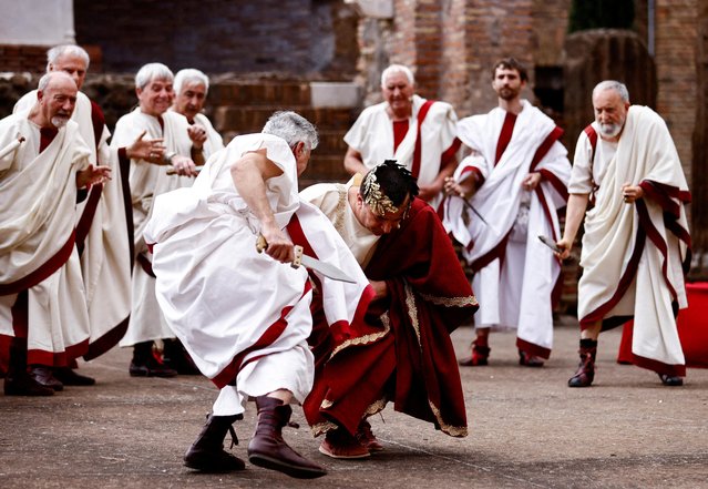 Members of Roman historical society “Gruppo Storico Romano” take part in a re-enactment of the “Ides of March”, known also as the date on which Julius Caesar was assassinated in 44 BC, in the archaeological area of Largo Argentina in Rome, Italy on March 15, 2023. (Photo by Yara Nardi/Reuters)