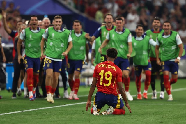 Spain's forward #19 Lamine Yamal celebrates scoring his team's first goal during the UEFA Euro 2024 semi-final football match between Spain and France at the Munich Football Arena in Munich on July 9, 2024. (Photo by Franck Fife/AFP Photo)