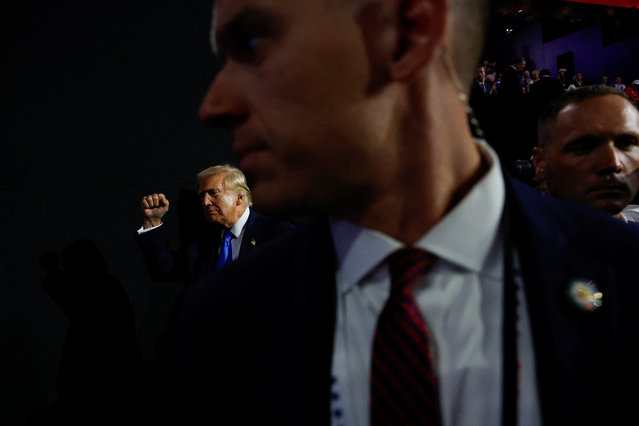 Secret Service surrounds Republican presidential nominee and former U.S. President Donald Trump as he leaves at the conclusion of Day 2 of the Republican National Convention (RNC), at the Fiserv Forum in Milwaukee, Wisconsin on July 16, 2024. (Photo by Evelyn Hockstein/Reuters)