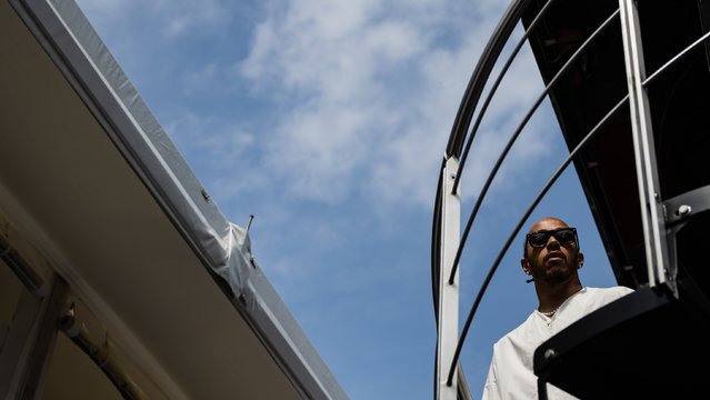 Mercedes driver Lewis Hamilton of Britain arrives at the paddock before the third practice session for the Formula One Hungarian Grand Prix at the Hungaroring circuit, in Mogyorod, near Budapest, 20 July 2024. (Photo by Martin Divisek/EPA/EFE)