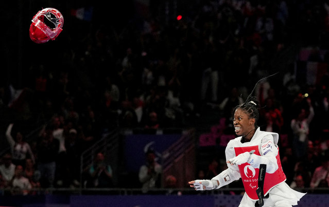 Djelika Diallo of France celebrates after winning against Yao Yinan of China in women's K44 65kg taekwondo semifinal in Paris, France on August 30, 2024. (Photo by Maja Smiejkowska/Reuters)