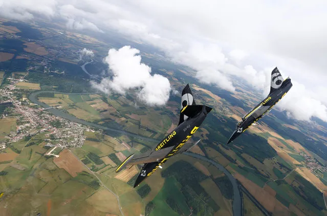 Breitling Jet Team with their L-39 Albatros aircrafts perform maneuvers during a presentation event ahead of the Sion Airshow near Switzerland in Dijon, France June 30, 2017. (Photo by Denis Balibouse/Reuters)
