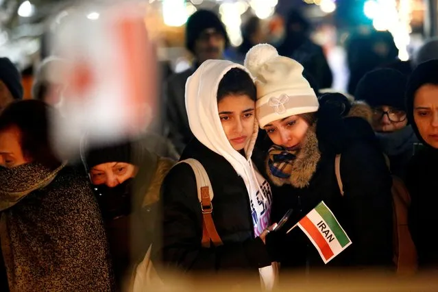 Mourners attend a vigil for the victims of a Ukrainian passenger jet which was shot down in Iran, in North Vancouver, British Columbia, Canada on January 14, 2020. (Photo by Jesse Winter/Reuters)