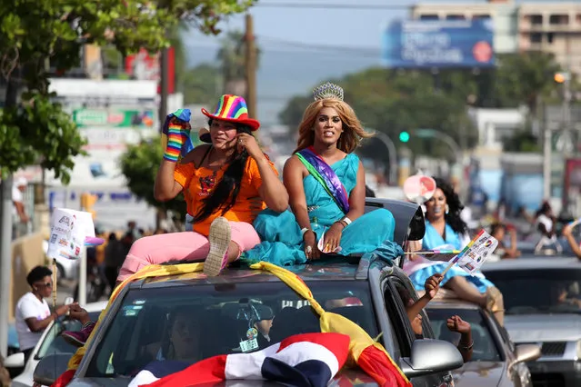 Revellers take part in the annual gay pride parade in Santo Domingo in the Dominican Republic July 3, 2016. (Photo by Ricardo Rojas/Reuters)
