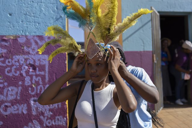 Carnival performers prepare for the annual Orange Farm Carnival, in Johannesburg, South Africa, 01 December 2024. (Photo by Kim Ludbrook/EPA/EFE)