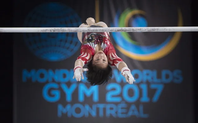Mai Murakami of Japan performs on the uneven bars during the women's individual all-around final at the Artistic Gymnastics World Championships Friday, October 6, 2017 in Montreal. (Photo by Paul Chiasson/The Canadian Press via AP Photo)