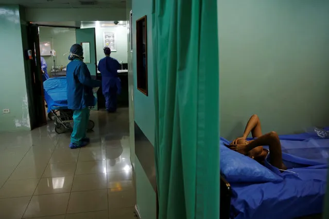 A patient lies in bed while recovers after sterilization surgery in a hospital in Caracas, Venezuela July 27, 2016. (Photo by Carlos Garcia Rawlins/Reuters)