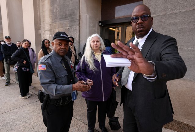 HHS employee Julie Siegel stands outside the Mary E. Switzer Memorial Building as she was denied access, and her badge was taken away, after it was reported that the Trump administration fired staff at the Centers for Disease Control and Prevention and at the Food and Drug Administration, as it embarked on its plan to cut 10,000 jobs at HHS in Washington, D.C., U.S., April 1, 2025. (Photo by Kevin Lamarque/Reuters)