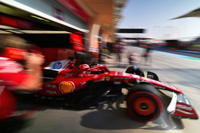 Ferrari's Monegasque driver Charles Leclerc drives in the pit during the third practice session ahead of the Bahrain Formula One Grand Prix at the Bahrain International Circuit in Sakhir on April 12, 2025. (Photo by Andrej Isakovic/AFP Photo)