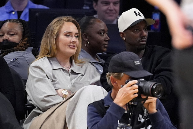 Singer Adele, left, and sports agent Rich Paul watch during the second half in Game 1 of an NBA first-round playoff series between the Los Angeles Lakers and the Minnesota Timberwolves, Saturday, April 19, 2025, in Los Angeles. (Photo by Mark J. Terrill/AP Photo)