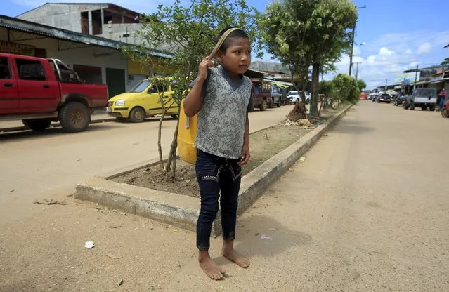 A Colombian Nukak Maku Indian boy is seen on the street in San Jose del Guaviare of Guaviare province, September 4, 2015. (Photo by John Vizcaino/Reuters)