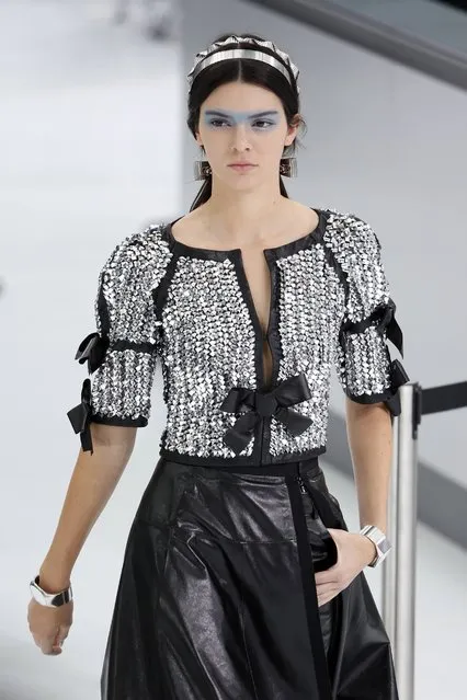 U.S. model Kendall Jenner presents a creation by German designer Karl Lagerfeld as part of his Spring/Summer 2016 women's ready-to-wear collection for French fashion house Chanel at the Grand Palais which is transformed into a Chanel airport during the Fashion Week in Paris, France, October 6, 2015. (Photo by Charles Platiau/Reuters)